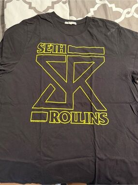 Junk Food WWE Seth Rollins Black Tee with Yellow Graphic